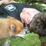 Charlie and I snuggled onto moss covered rocks.