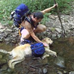 Krumy trying to drown Cooper in a stream.